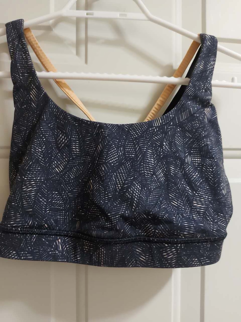 Lululemon sports bra with dark blue leaf print